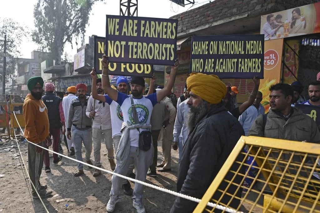 Tens of thousands of farmers have set up barricades on roads into New Delhi since November 26, vowing not to move until the laws are repealed. (AFP)
