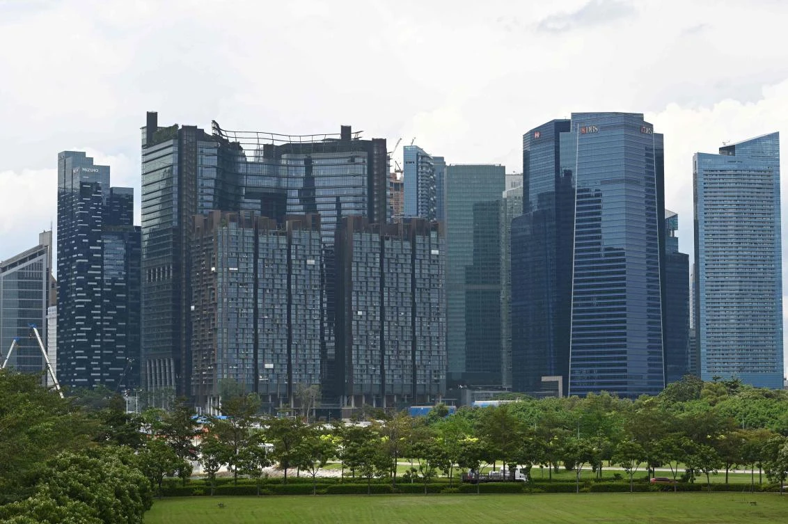 The agreement largely replicates an existing EU-Singapore pact, with the city-state saying it will cover more than $22 billion in trade. (AFP)