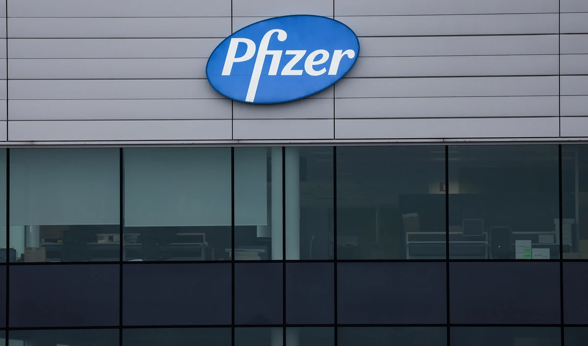 The logo of US multinational pharmaceutical company Pfizer, is pictured at a factory in Puurs, where Covid-19 vaccines are being produced for Britain, on Dec. 3, 2020. (AFP)