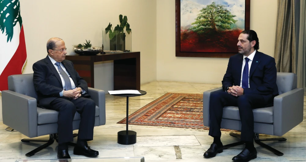 Lebanese Prime Minister-designate Saad Hariri meets with Lebanese President Michel Aoun at the presidential palace in Baabda, Lebanon on Wednesday. (Reuters)