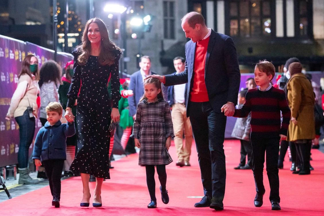 Britain's Prince William, Duke of Cambridge, his wife Catherine, Duchess of Cambridge, and their children Prince George of Cambridge (R), Princess Charlotte of Cambridge (3rd L) and Prince Louis of Cambridge (L) arrive to attend a special pantomime performance at London's Palladium Theatre in London on December 11, 2020. (AFP)