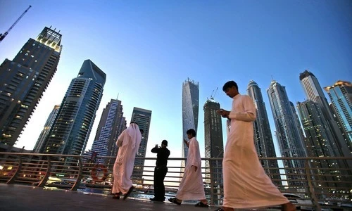 The number of shares owned by foreign investors in six UAE listed real estate companies rose to about 8.4 billion shares worth AED21.2 billion ($5.77 billion). (AFP/File Photo)