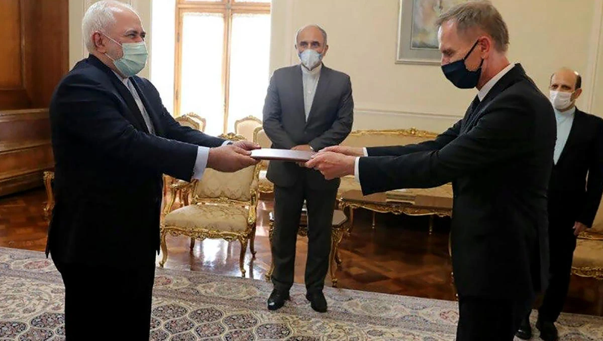 Iran on Dec 13, 2020, summoned German Ambassador to Tehran Hans-Udo Muzel (R). It’s not the first time, he was also summoned in September. (File/Iranian Foreign Ministry / AFP)