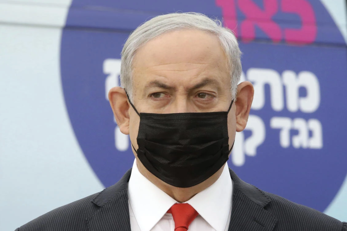 Israeli Prime Minister Benjamin Netanyahu visits the Maccabi Healthcare Services vaccine complex for COVID-19, in Tel Aviv, Israel, Dec. 13, 2020. (AP)