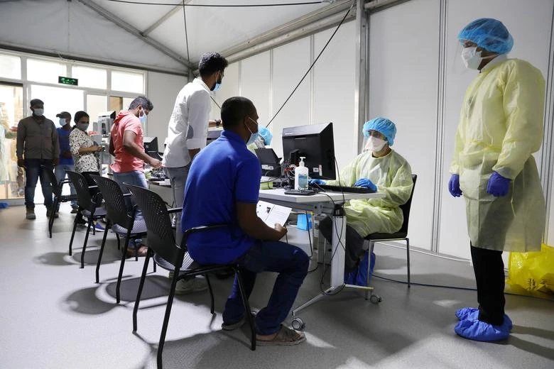 Members of medical staff wearing protective equipment, intake patients to be tested, amid the coronavirus disease outbreak, at the Cleveland Clinic hospital in Abu Dhabi, UAE. (File/Reuters)