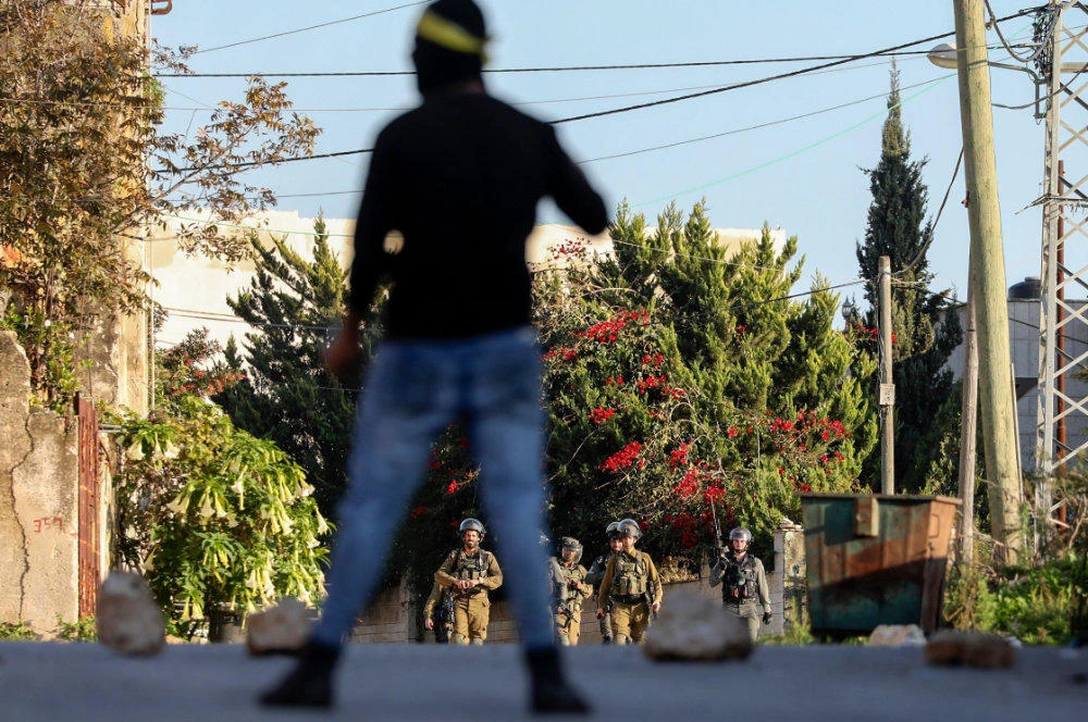 Palestinian foreign minister urges Israel to return to talks