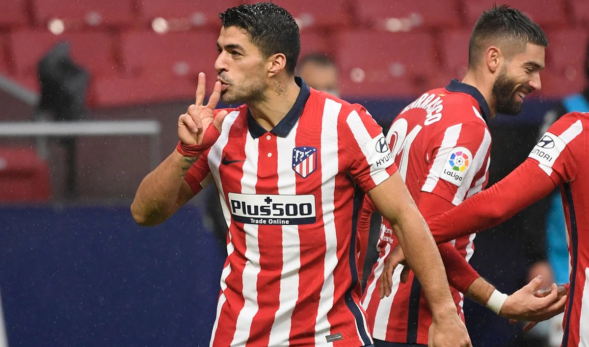 Atletico Madrid's Uruguayan forward Luis Suarez celebrates a goal during the Spanish league football match between Club Atletico de Madrid and Elche CF in Madrid on December 19, 2020. (AFP)