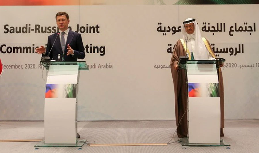 Saudi Energy Minister Prince Abdul Aziz bin Salman attends a press conference with Russia's Alexander Novak at the Ritz-Carlton Hotel in Riyadh on December 19, 2020. (Reuters)