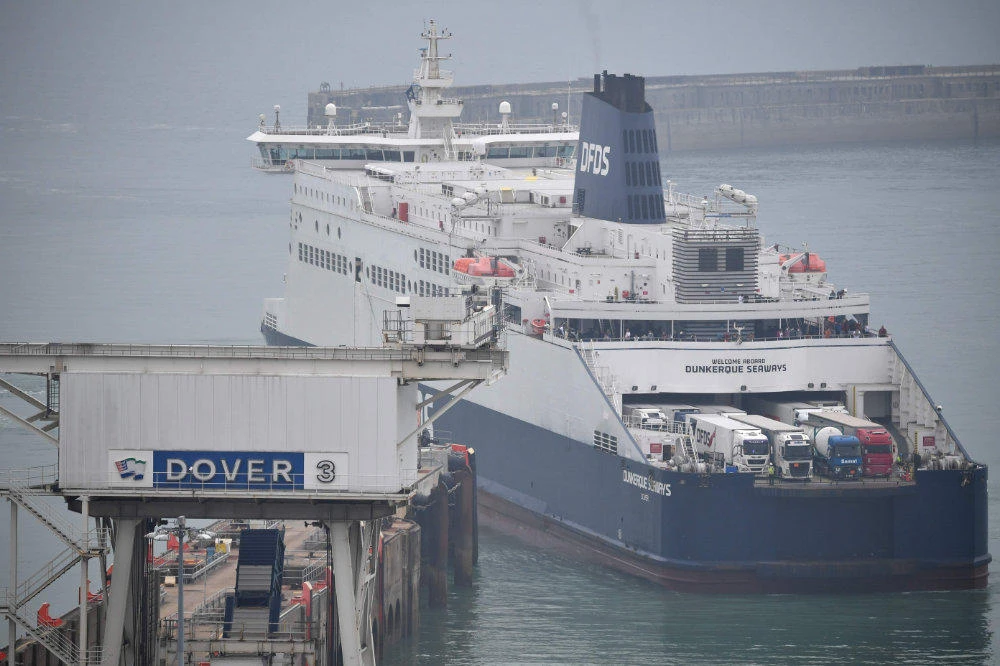 In this file photo taken on August 14, 2020 a DFDS ferry moors at the port of Dover in southeast England. France has halted all travel from Britain for 48 hours from midnight on December 20, 2020 after a new fast-spreading strain of the Covid-19, the novel coronavirus, appeared in the UK. (AFP / Ben Stansall)