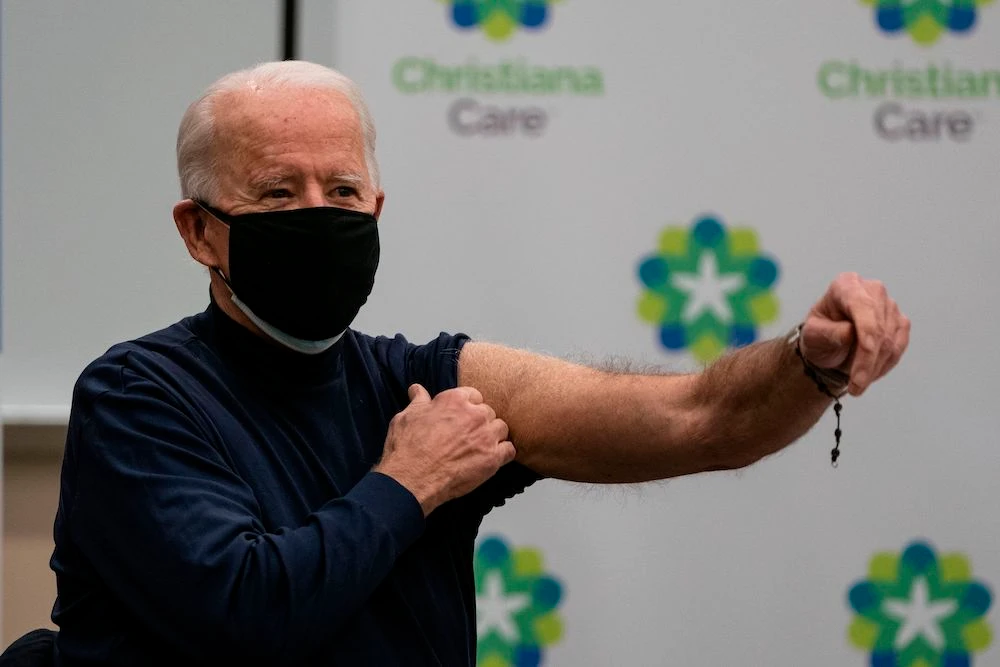 US President-elect Joe Biden holds out his arm after receiving a COVID-19 vaccination at the Christiana Care campus in Newark, Delaware on Dec. 21, 2020. (AFP)