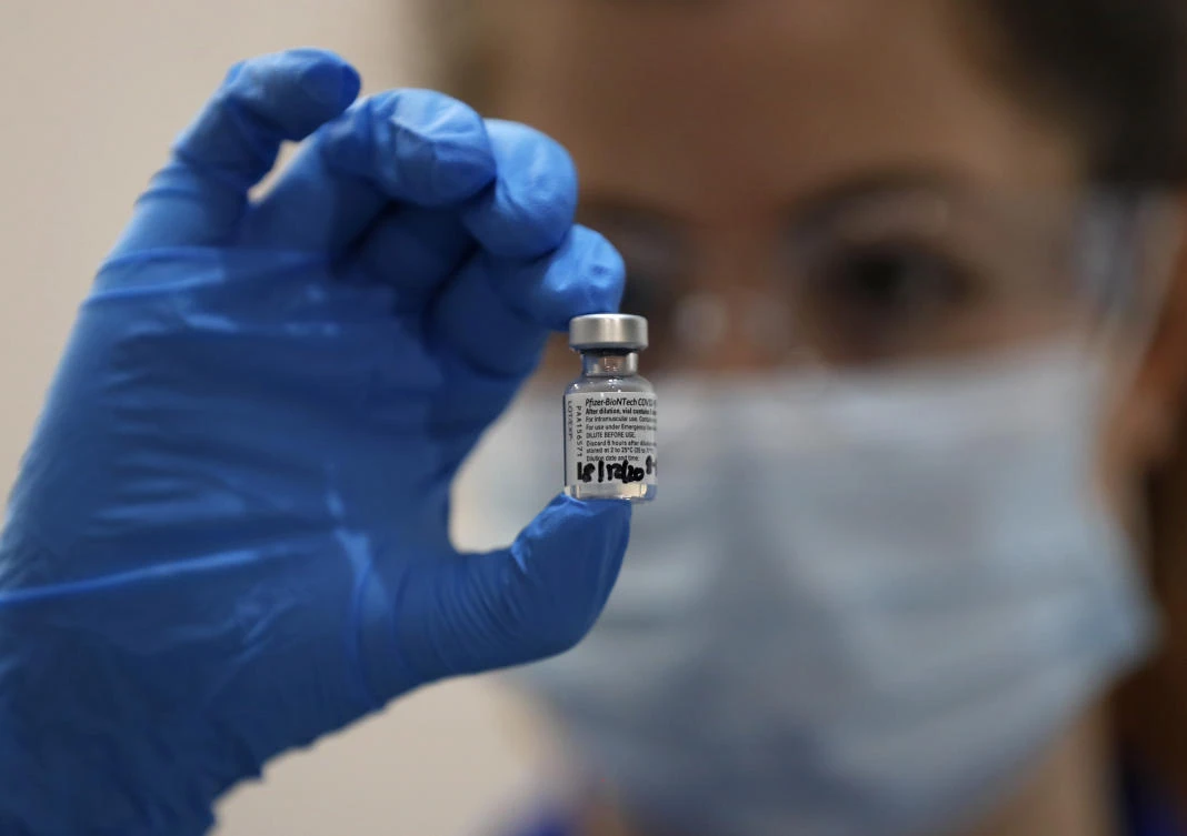BioNTech’s vaccine, developed together with US pharmaceutical company Pfizer, is authorized for use in more than 45 countries including Britain. (AP)