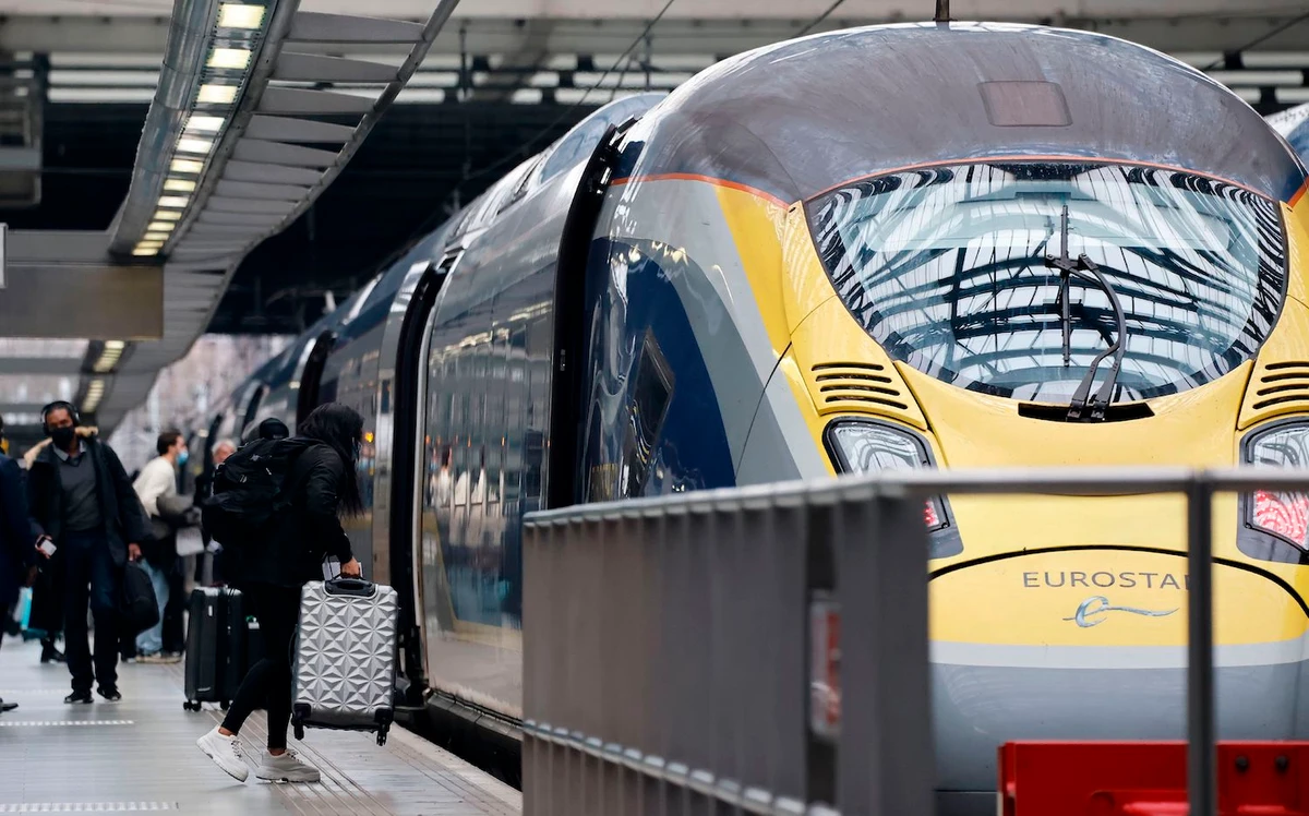 Passengers board a Eurostar train at St Pancras International station in London on December 23, 2020, as services prepare to resume following a 48 hour closure of the French border, due to a new coronavirus strain being discovered in the UK. (AFP)