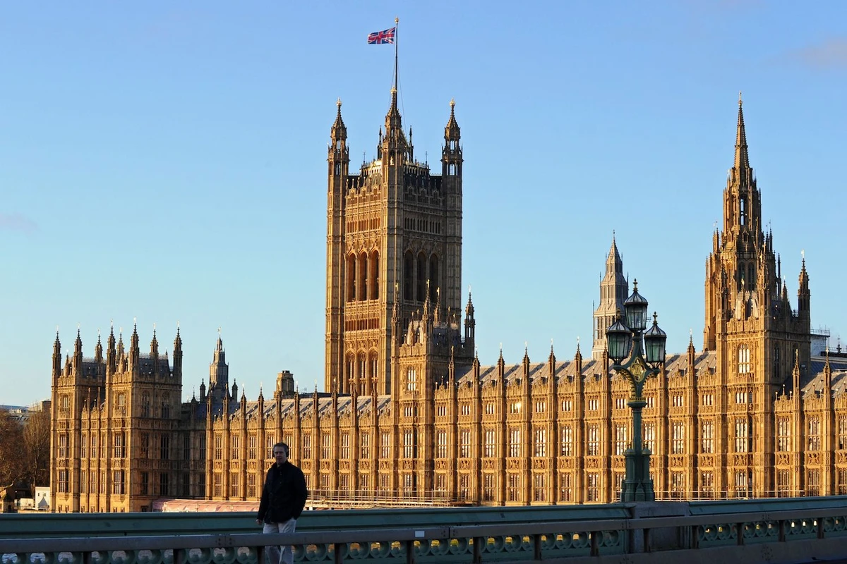 A Union flag flies on top of the Victoria Tower, part of The Palace of Westminster in London on Dec. 24, 2020. (AFP)