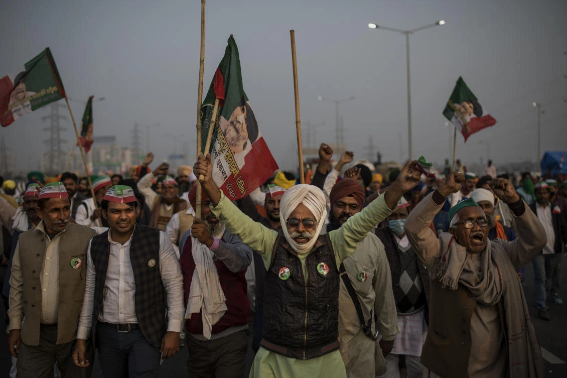 Indian farmers fear the government would stop buying wheat and rice at guaranteed prices, leaving them at the mercy of big corporates. (AP)