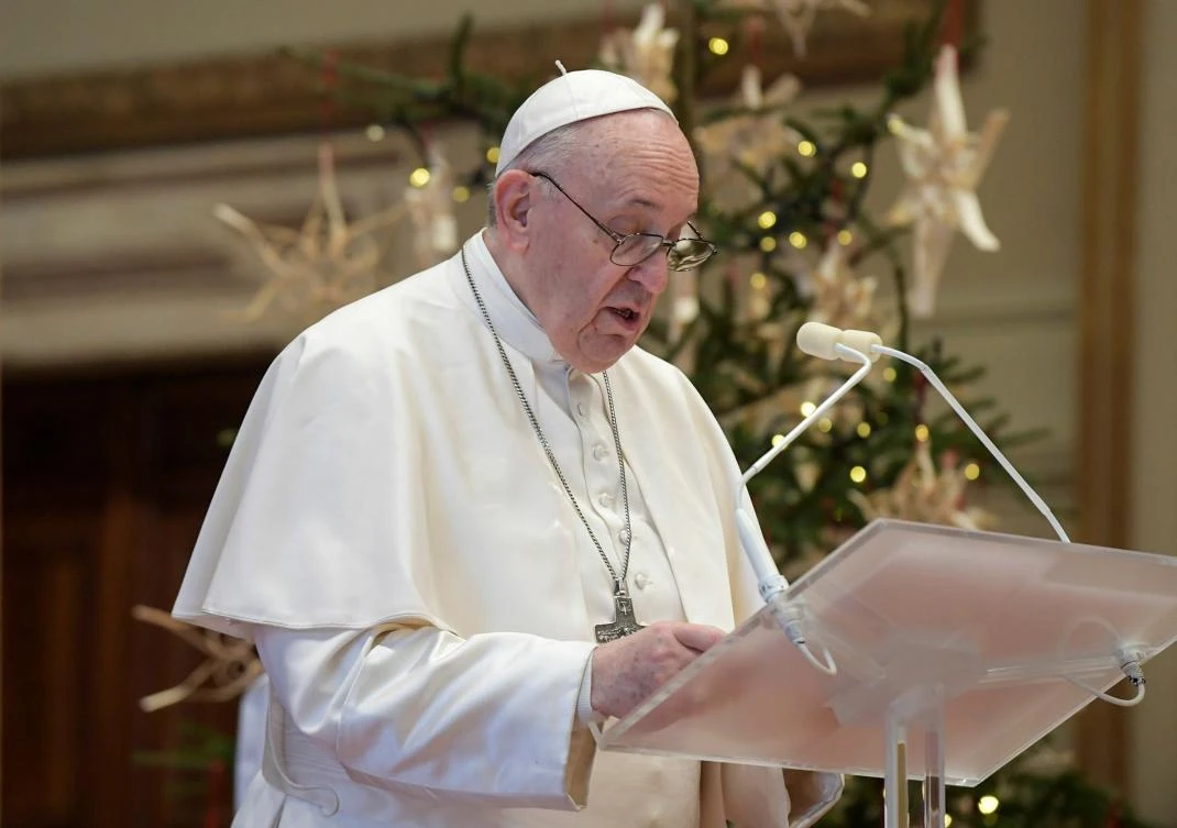 This handout photo released by the Vatican Media shows Pope Francis delivering his live-streamed Urbi et Orbi blessing from the Vatican Blessing hall. (AFP)