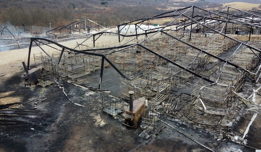 Remains of burnt tents and beds are seen at the migrant center “Lipa” in Bihac, Bosnia and Herzegovina Dec. 24, 2020. Picture taken with a drone. (Reuters)