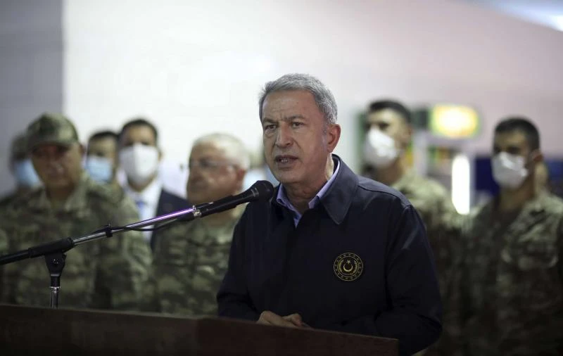 Turkish Defense Minister Hulusi Akar speaks to Libyan and Turkish officials in Tripoli, the capital of Libya’s GNA. (File/AP)