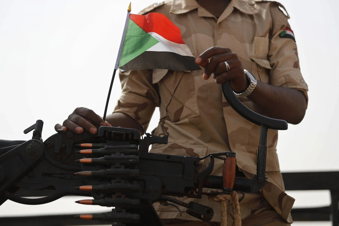 A Sudanese soldier from the Rapid Support Forces or RSF, led by Gen. Mohammed Hamdan Dagalo, stands on his vehicle during a military-backed tribe's rally, in the East Nile province, Sudan. (File/AP)