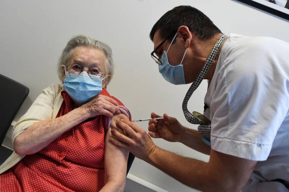 The number of people in France who have died from COVID-19 infections rose by 363 to 63,109. (AFP)