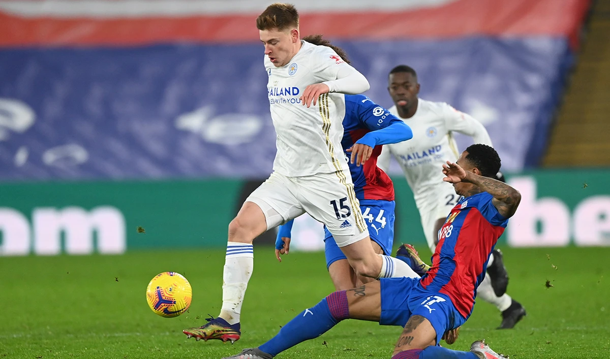 Leicester’s Harvey Barnes, left, and Crystal Palace’s Nathaniel Clyne during their English Premier League match at Selhurst Park stadium in London Monday. (AP)