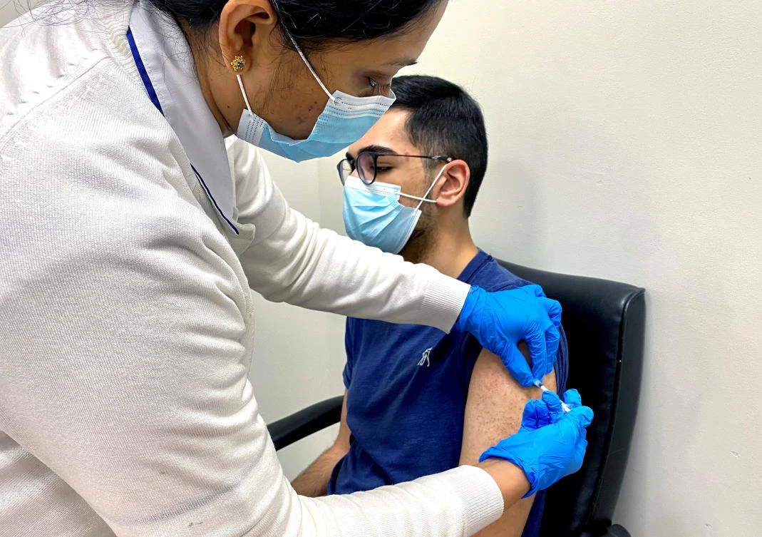 A man receives a dose of a vaccine against the coronavirus disease (COVID-19), in Dubai, United Arab Emirates December 28, 2020. Picture taken December 28, 2020. (Reuters)