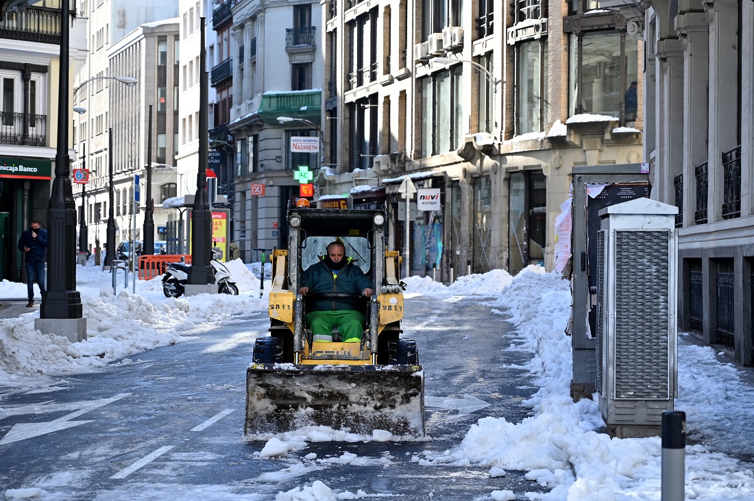 A snow plow clears a road near Vizzavona train station, on Jan. 11, 2021 on the French Mediterranean island of Corsica, following heavy snow falls over southern Europe. (AFP)