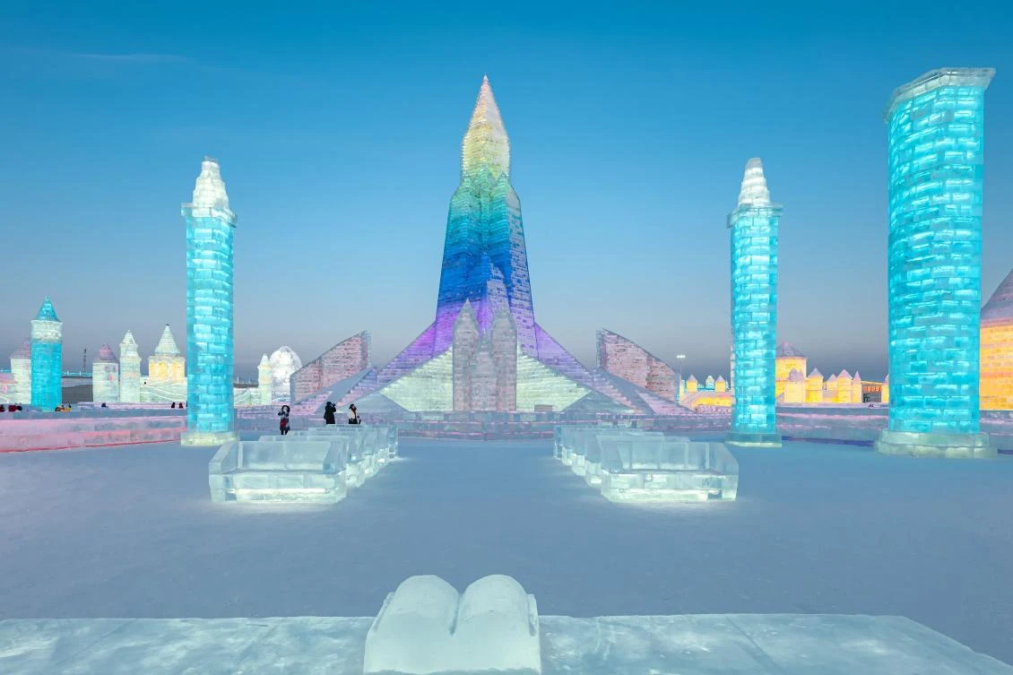 TOPSHOT - Ice sculptures are seen at the Harbin Ice and Snow Festival in Harbin, in northeastern China's Heilongjiang province on January 5, 2021. - China OUT / AFP / STR