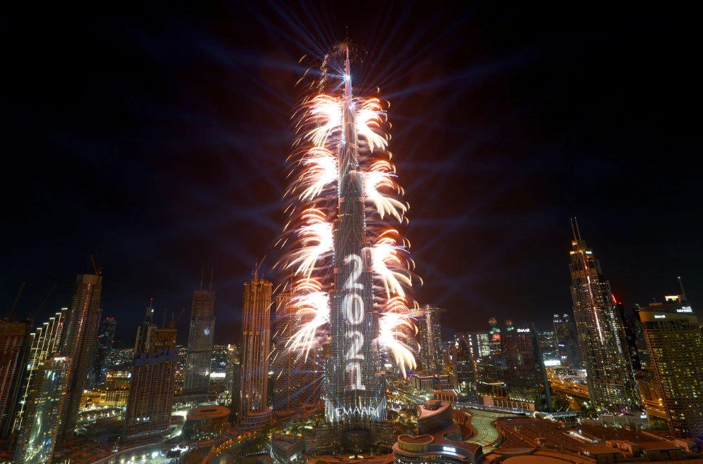 New Year’s revelries muted by virus as curtain closed on 2020