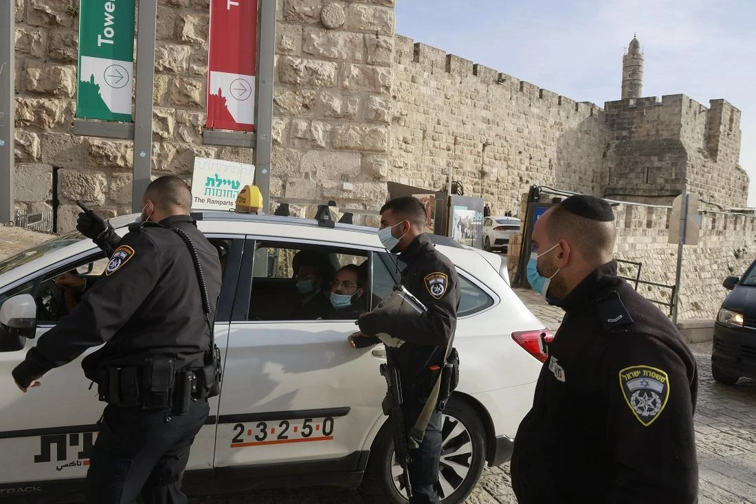 The government touted the technology, normally used to catch wanted Palestinian militants, as a breakthrough against the virus. But months later, the tool’s effectiveness is being called into question and critics say its use has come at an immeasurable cost to the country’s democratic principles. (File/AFP)