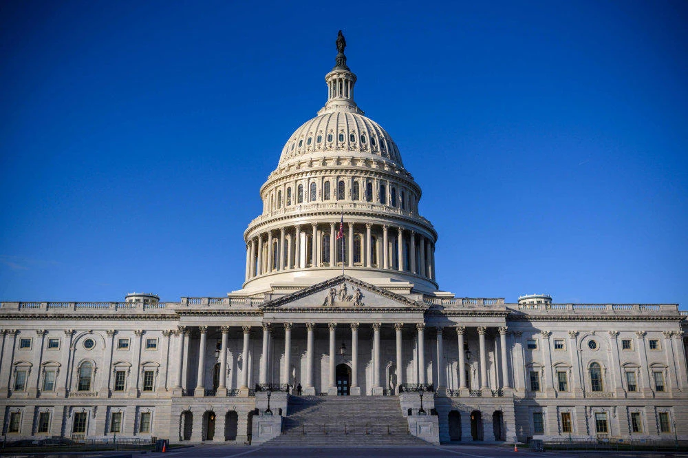 In this file photo taken on December 29, 2020 the US Capitol building is seen on a cold and sunny winter day as Congress is in session in Washington. The US Congress will hold a joint session on Wednesday to confirm the electoral college results showing Joe Biden as winner of the Nov. 3, 2020 presidential election. (AFP / Eric Baradat)