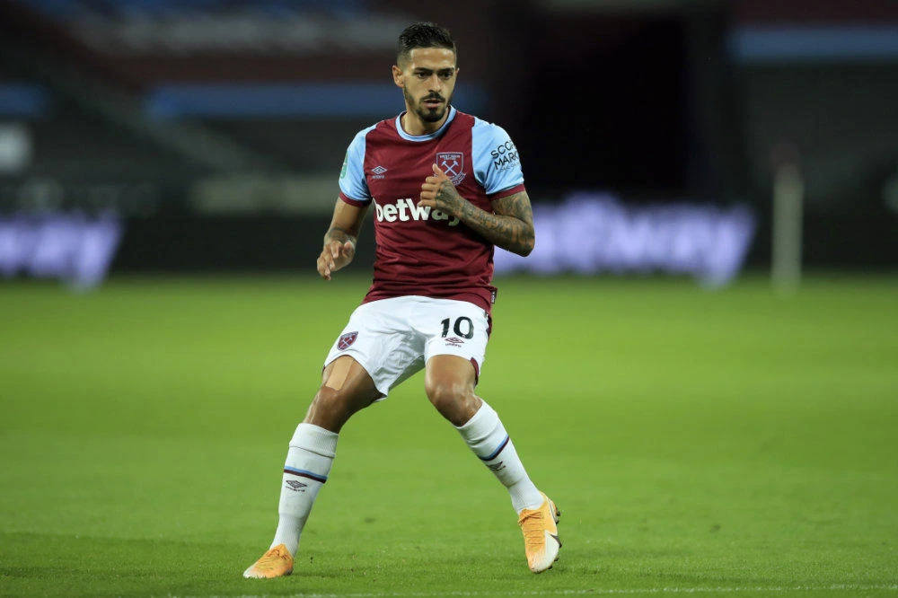 This Sept. 15, 2020 file photo West Ham's Manuel Lanzini on the pitch during their English League Cup soccer match against Charlton Athletic at London stadium in London. Lanzini was among four Premier League players from Tottenham and West Ham found to have broken English lockdown laws. (Adam Davy/Pool via AP)