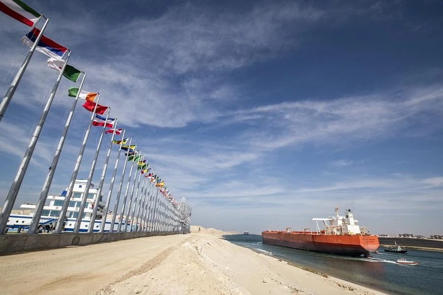 The head of the canal’s authority said transit fees for all types of ships passing through the canal would remain unchanged in 2021. (File/AFP)