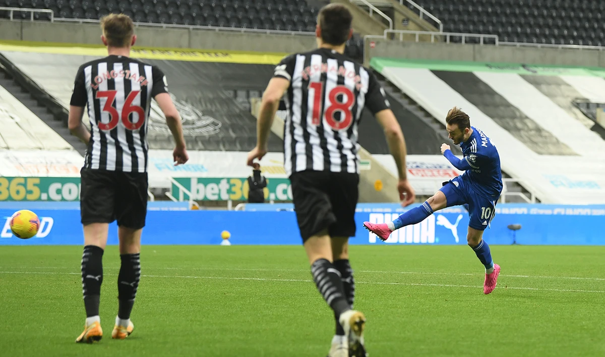 Leicester’s James Maddison, right, scores his side’s opening goal during the English Premier League match against Newcastle United on Sunday. (AP)