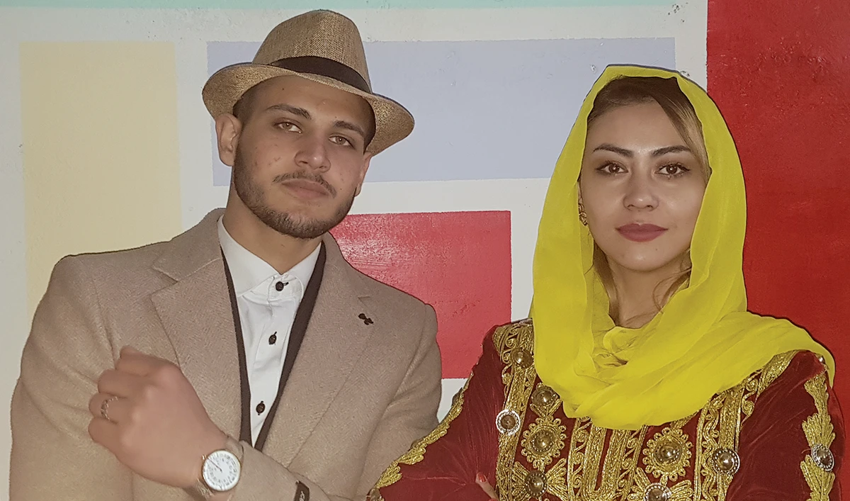 Winners of the Afghanistan Mr. and Miss Beauty competition Murtaza Safi and Nigara Sadaat pose for a souvenir photograph in Kabul. (AN photo)