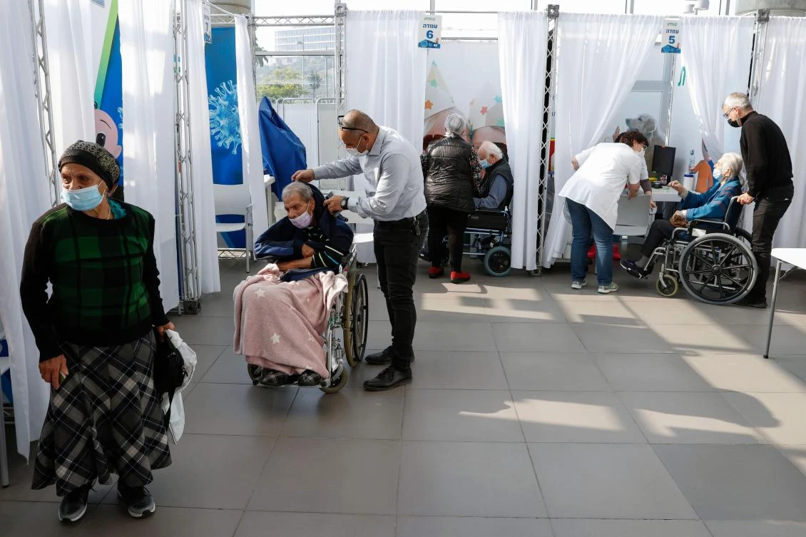 Israel has begun to vaccinate its population at one of the quickest rates in the world, and it aims to reach all vulnerable citizens by late January. (AFP)