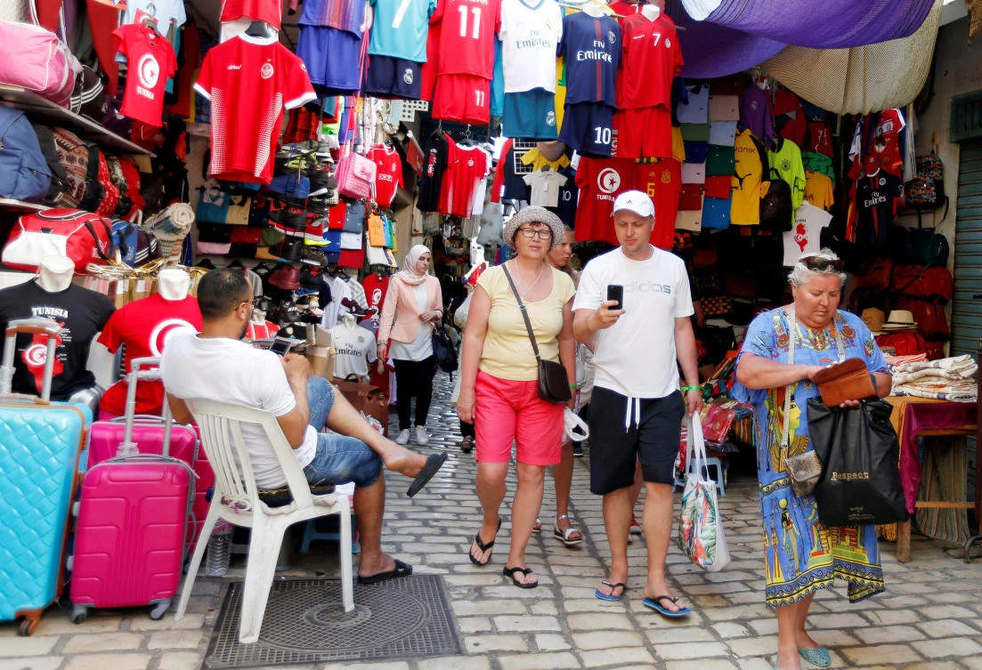 Russian tourists are seen shopping at the old medina in Sousse, Tunisia, June 22, 2018. Picture taken June 22, 2018. (Reuters)