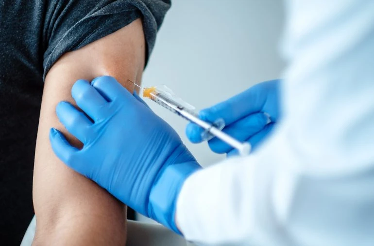 Syrian doctor who avoided deportation pledges to help UK vaccine drive
