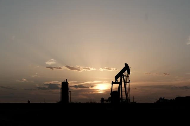Oil pump jacks work at sunset near Midland, Texas, U.S., August 21, 2019. (Reuters)