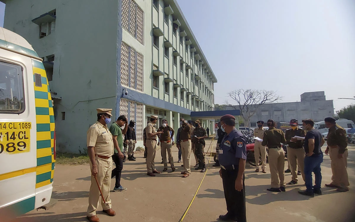 Police officers investigate the scene after a fire broke out at District General Hospital in Bhandara, about 70 kilometers from Nagpur, India, Saturday, Jan. 9, 2021. (AP)