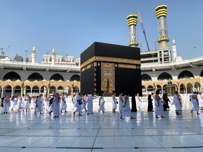 Muslims keeping social distance as they perform around the Kaaba, in Makkah, Saudi Arabia. (File: Reuters)