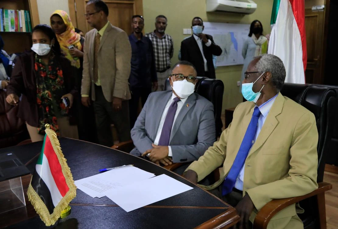 Sudan's Minister of Irrigation and Water Resources (R) and Minister for Foreign Affairs are pictured during a video conference meeting with their Egyptian and Ethopian counterparts in Khartoum on January 10, 2020. (AFP)