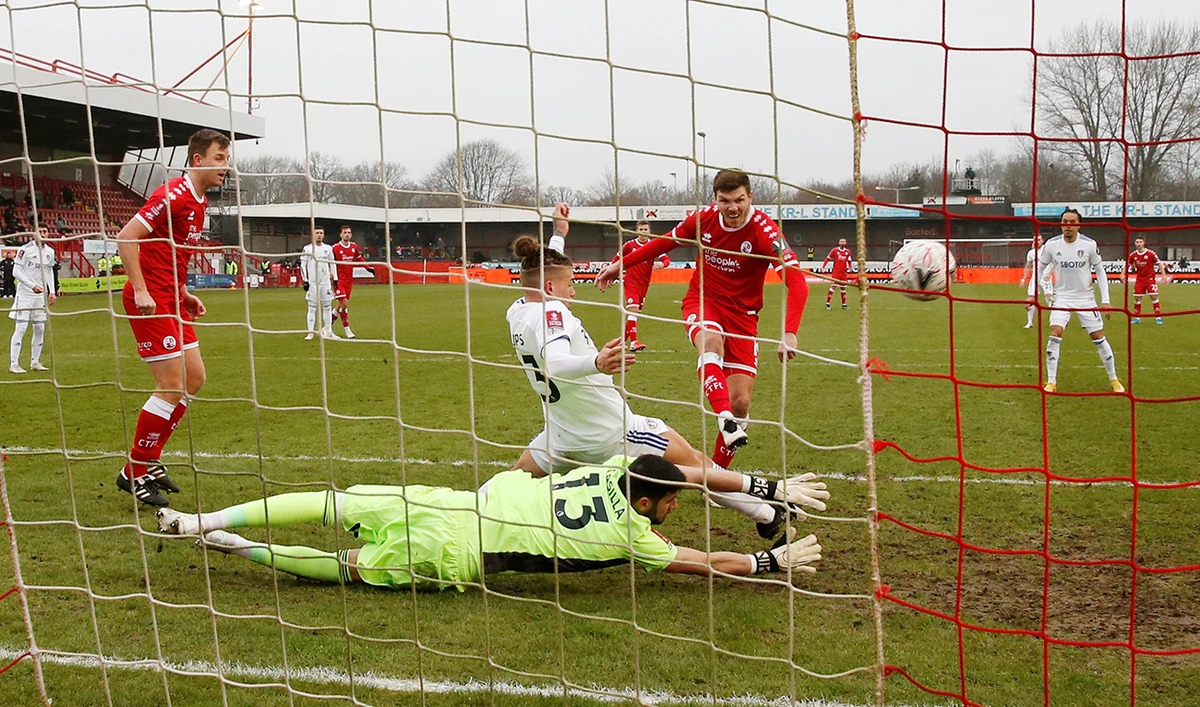 Crawley Town’s Jordan Tunnicliffe scores their third goal against Leeds in the FA Cup third round on Sunday. (Reuters)