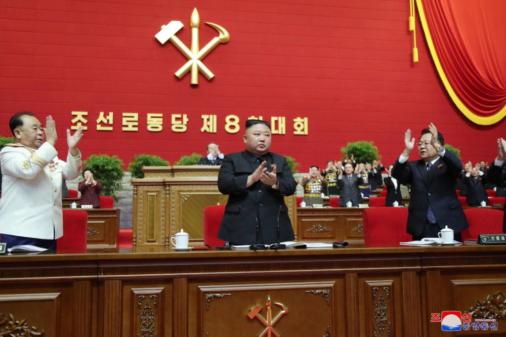 North Korean leader Kim Jong Un applauds at the 8th Congress of the Workers' Party in Pyongyang, North Korea, on January 11, 2021. (Korean Central News Agency/via REUTERS)
