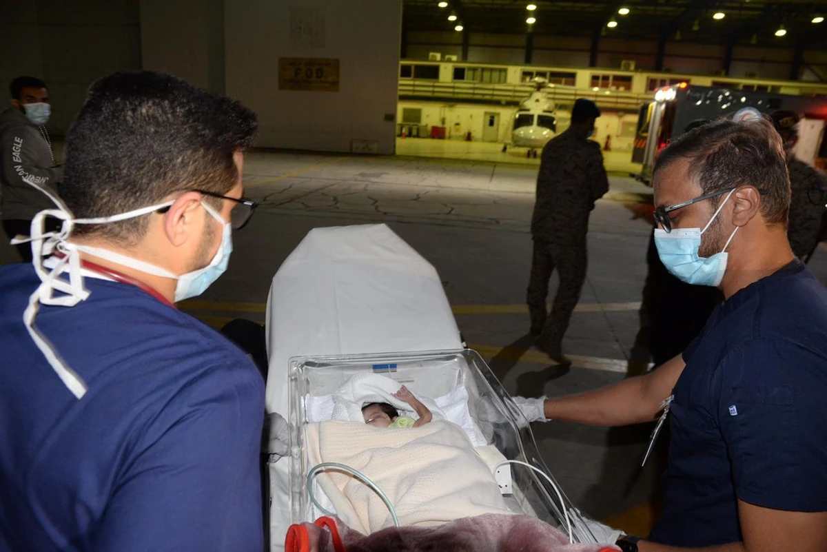 A medical evacuation plane on Tuesday arrived in Saudi Arabia carrying Yemeni parasitic twins for possible separation surgery. (Supplied)
