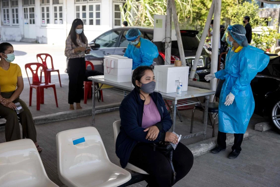 People wait to be tested for Covid-19 coronavirus at the Urban Institute for Disease Prevention and Control in Bangkok on January 11, 2021. (AFP)