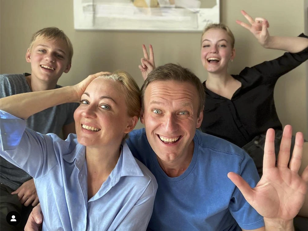 Russian opposition activist Alexei Navalny poses with his wife and children in this image taken from an Instagram video he released on Dec. 31, 2020. (Navalny Instagram account via AP)