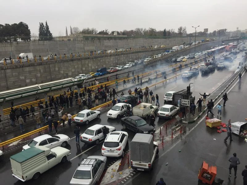 People stop their cars on a highway to protest increased gas prices in Tehran, Iran, November 16, 2019. (Reuters)