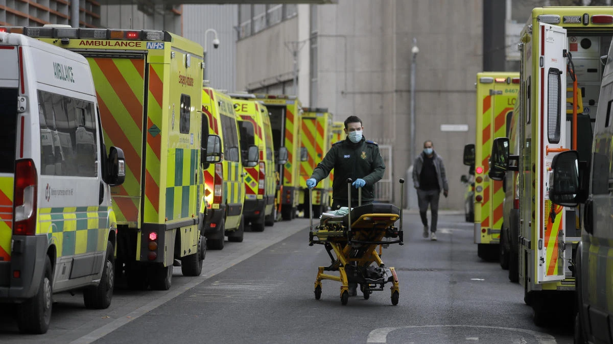 Ambulances are parked outside the Royal London Hospital in London, Monday, Jan. 11, 2021 during England's third national lockdown to curb the spread of coronavirus. (AP)