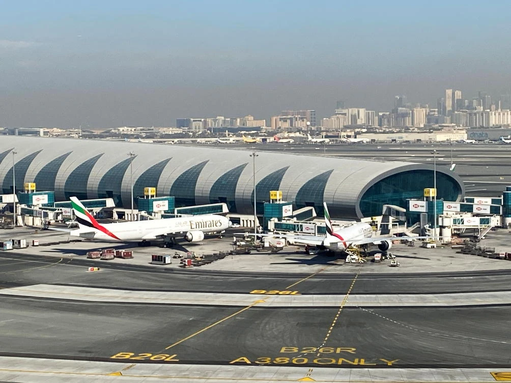 Emirates planes are seen on the tarmac in a general view of Dubai International Airport in Dubai, United Arab Emirates, January 13, 2021. (Reuters)
