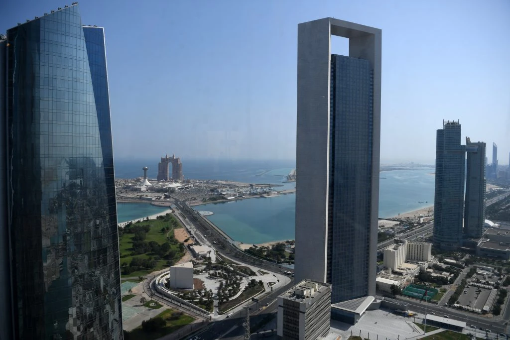 A general view taken on May 29, 2019 shows the sea front promenade in the Emirati capital Abu Dhabi with the ADNOC headquarters (Abu Dhabi National Oil Company) office complex (C) in the foreground. (AFP/File Photo)